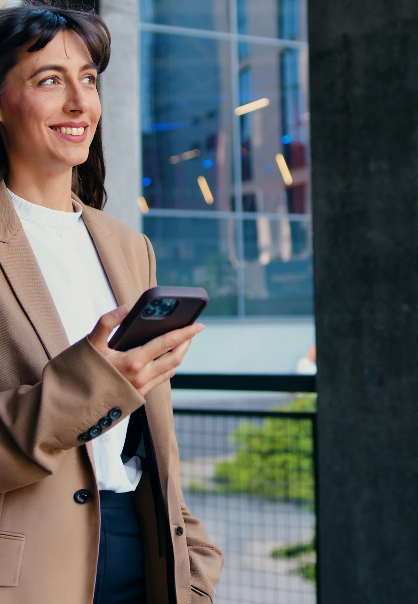 smiling person with a phone