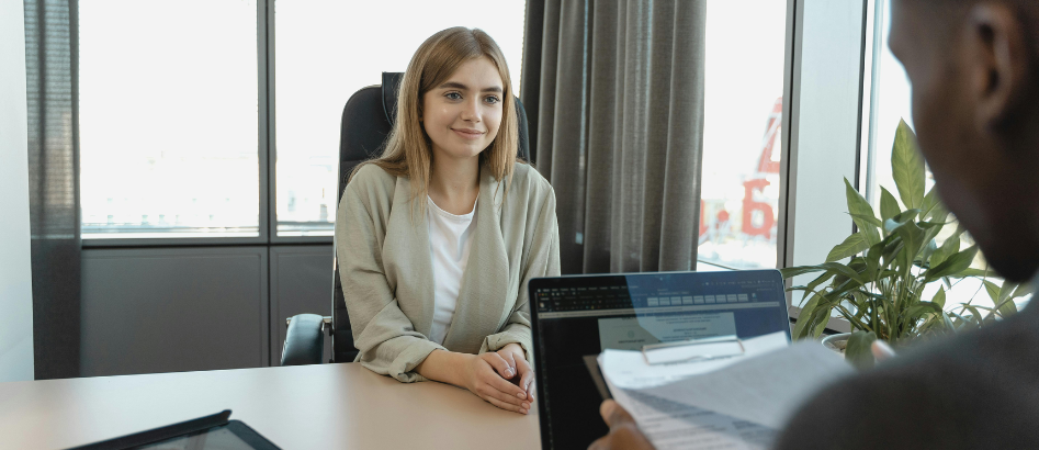 An interview candidate answering the 'Why do you want this job?' question confidently.