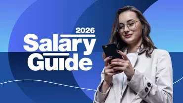 Woman smiling with her phone