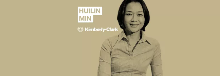 Person in a collared shirt with a beige background, text reads 'Huilin Min Kimberly-Clark'.