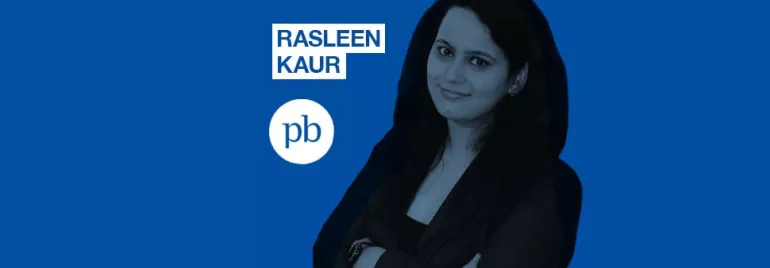 Woman posing confidently with arms crossed, blue background, text 'Rasleen Kaur' and 'pb' logo alongside.