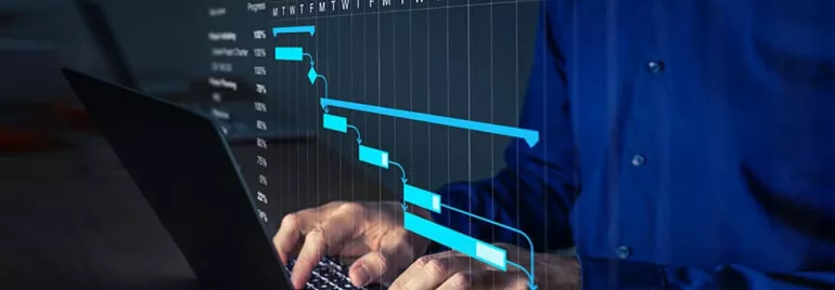 Person using a laptop with a project management chart overlay on the screen.