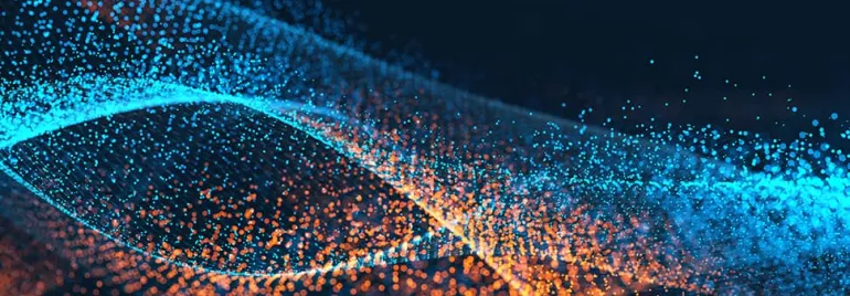 Abstract image with swirling blue and orange particles against a dark background.