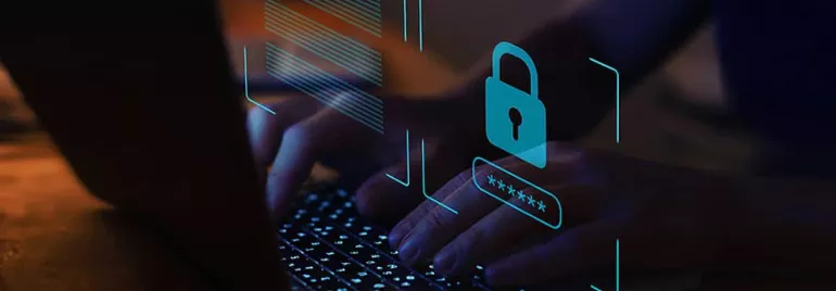 Hands typing on a laptop with digital lock and password symbols overlay.