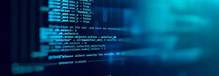 Close-up of computer code on a screen with a blue background.