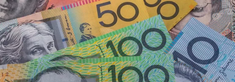 Australian banknotes in various denominations displayed in a fan.