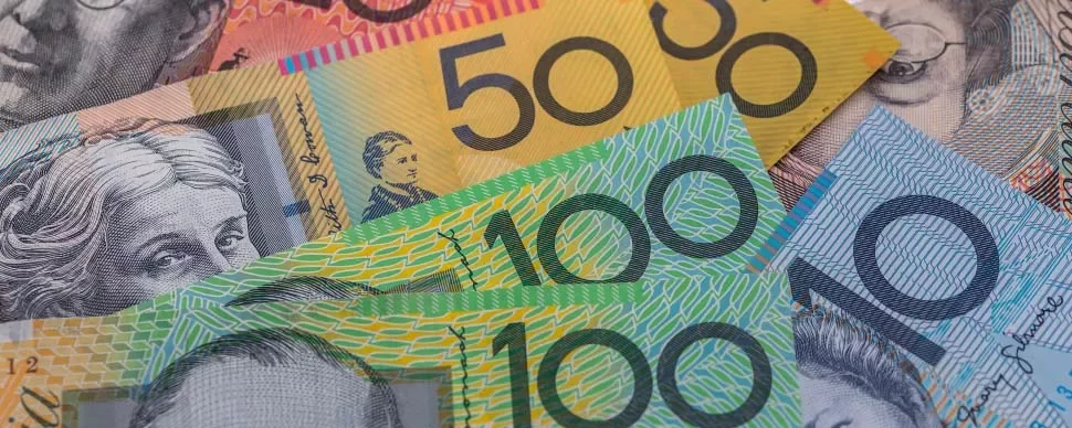 Australian banknotes in various denominations displayed in a fan.
