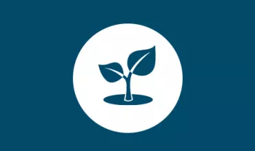 Icon of a seedling with two leaves in a white circle on a blue background.