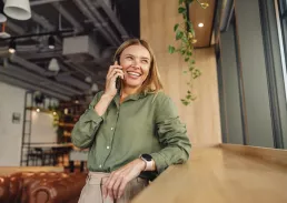 Executive talking on her phone