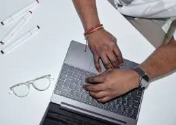 Executive hands working on the laptop