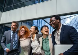 Group of executives laughing