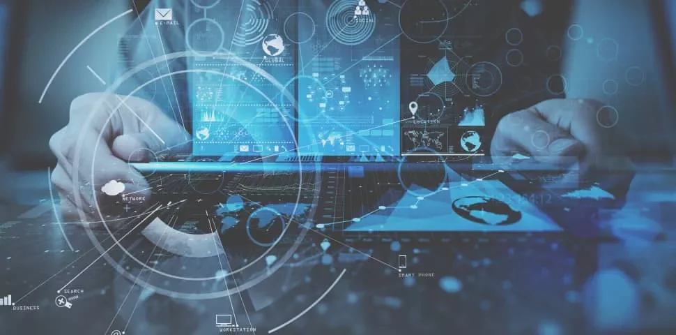 Person using laptop with digital overlay of global network icons.