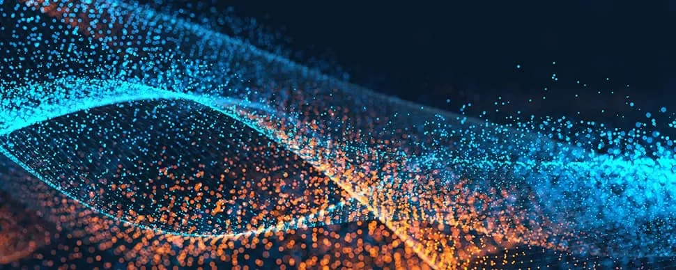Abstract image with swirling blue and orange particles against a dark background.