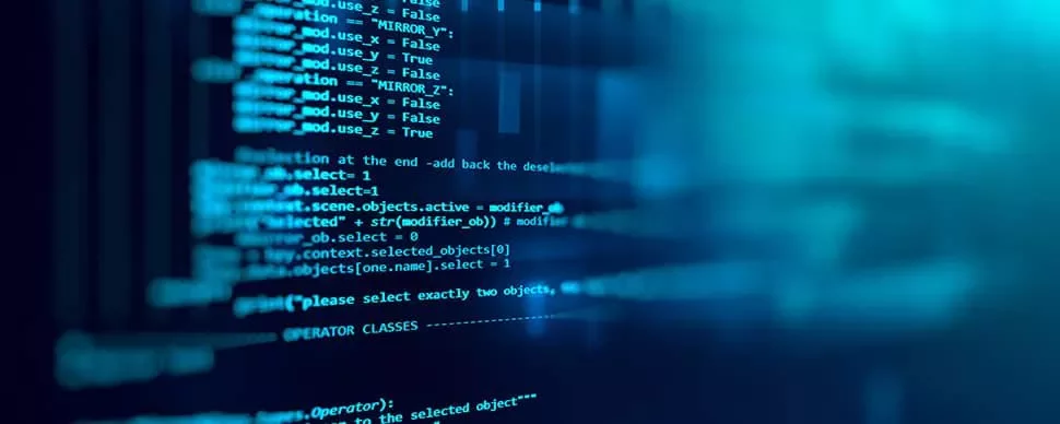 Close-up of computer code on a screen with a blue background.