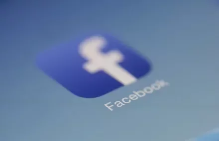 Close-up of the Facebook app icon on a smartphone screen.
