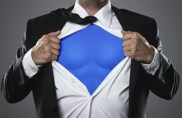 Man in a suit revealing superhero outfit underneath.